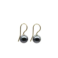 Side view of gold filled french hook earrings with Tahitian black pearls with a white background