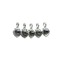 Set of five silver pendants with black pearls on a white background