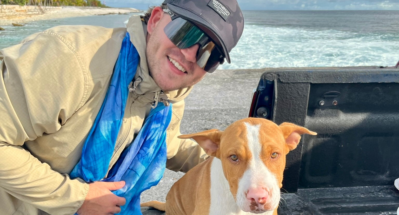 Photo of a man with a puppy dog