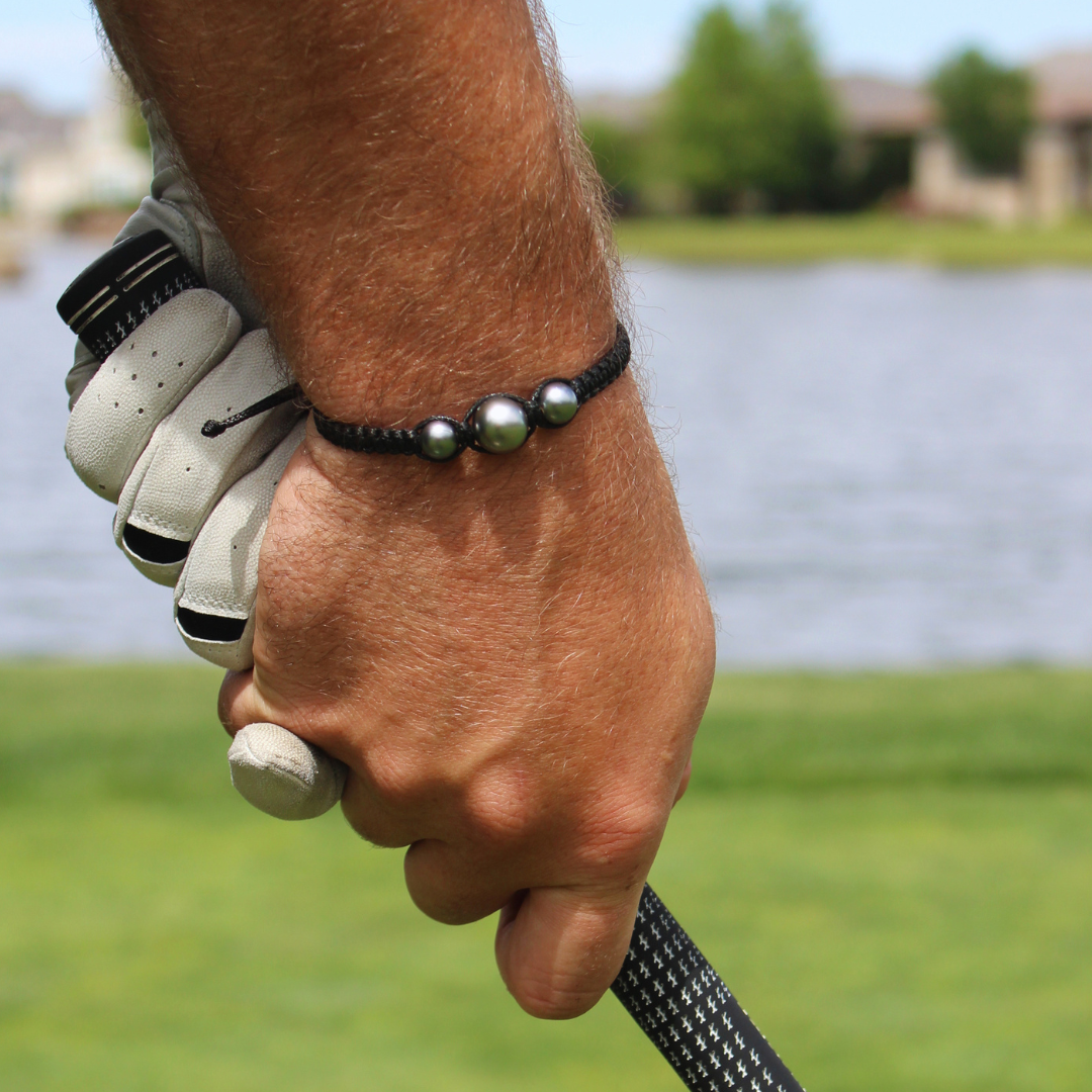 Takaroa Bracelet worn on the golf course — durable, waterproof Tahitian pearl bracelet for everyday wear