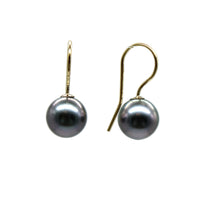 Front and side view of gold filled french hook with Tahitian black pearl earrings with a white background