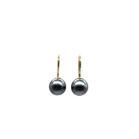 Front view of gold filled french hook earrings with black pearls on a white background