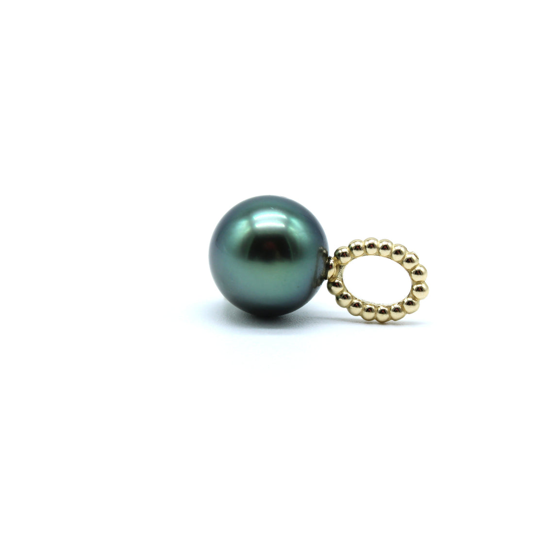 Single pearl on a gold oval pendant against a white background