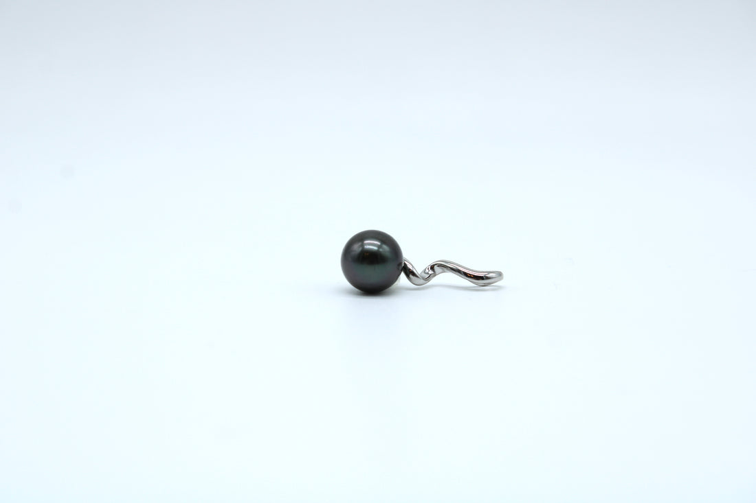 Side view of sterling silver swirl pendant with a black pearl with a white background