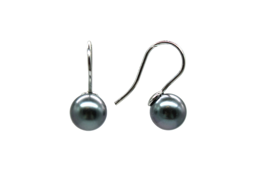 Pair of white gold french hook earrings front and side view with a white background