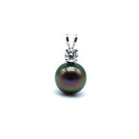 Black pearl white gold pendant with diamond on a white background